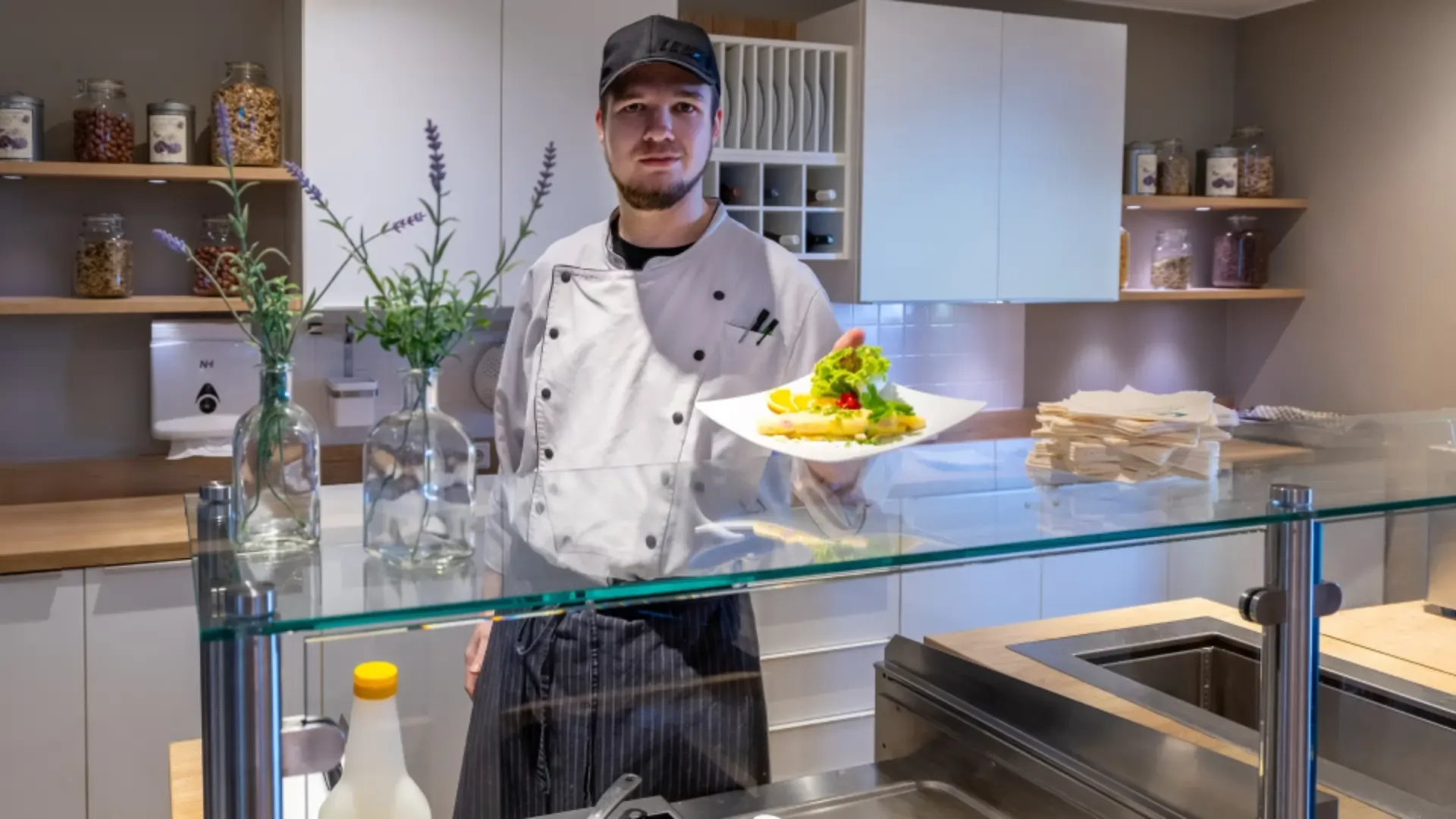 chef prepares fresh fried eggs