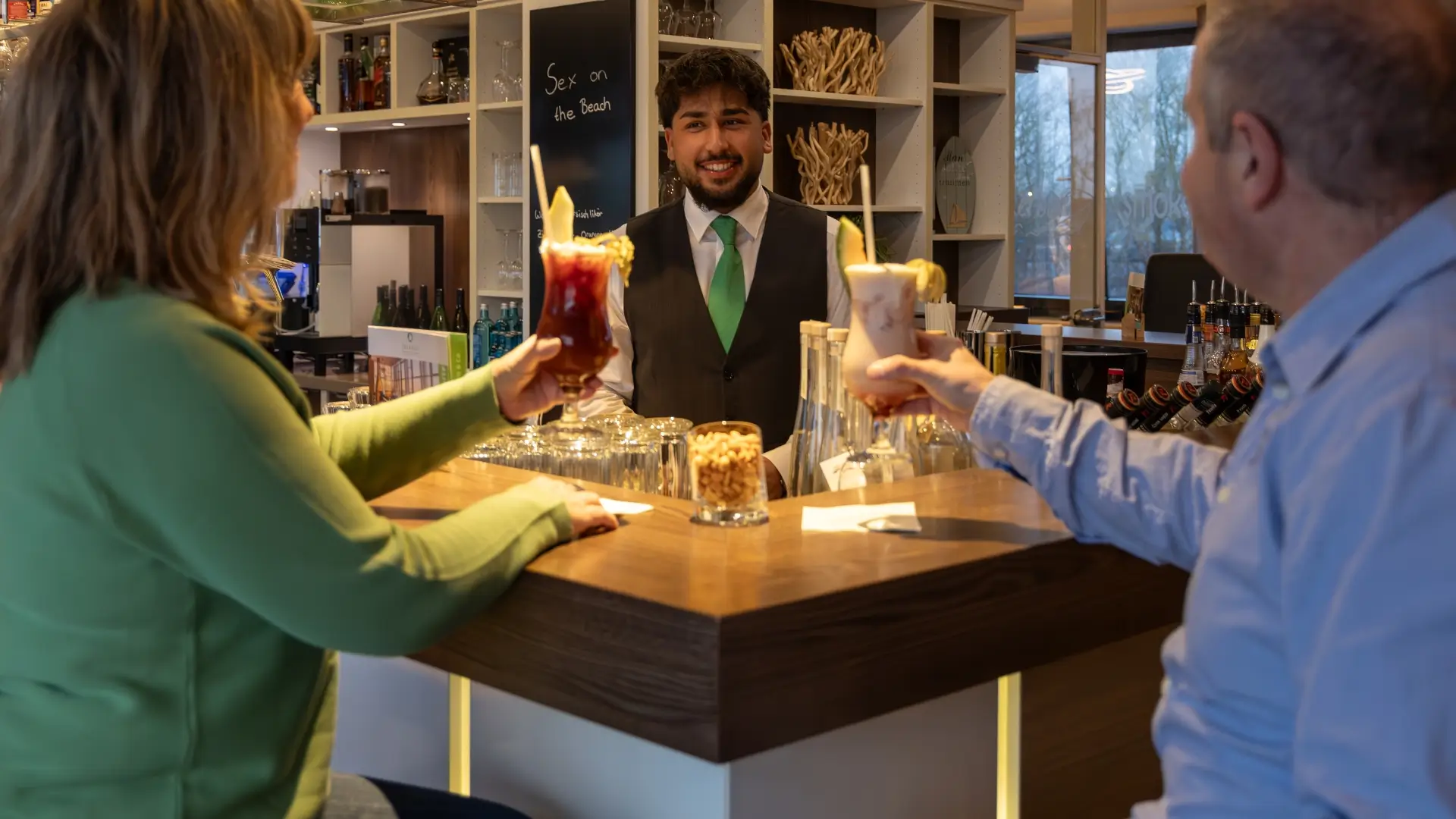 Bartender makes delicious cocktails in the Tenderbar