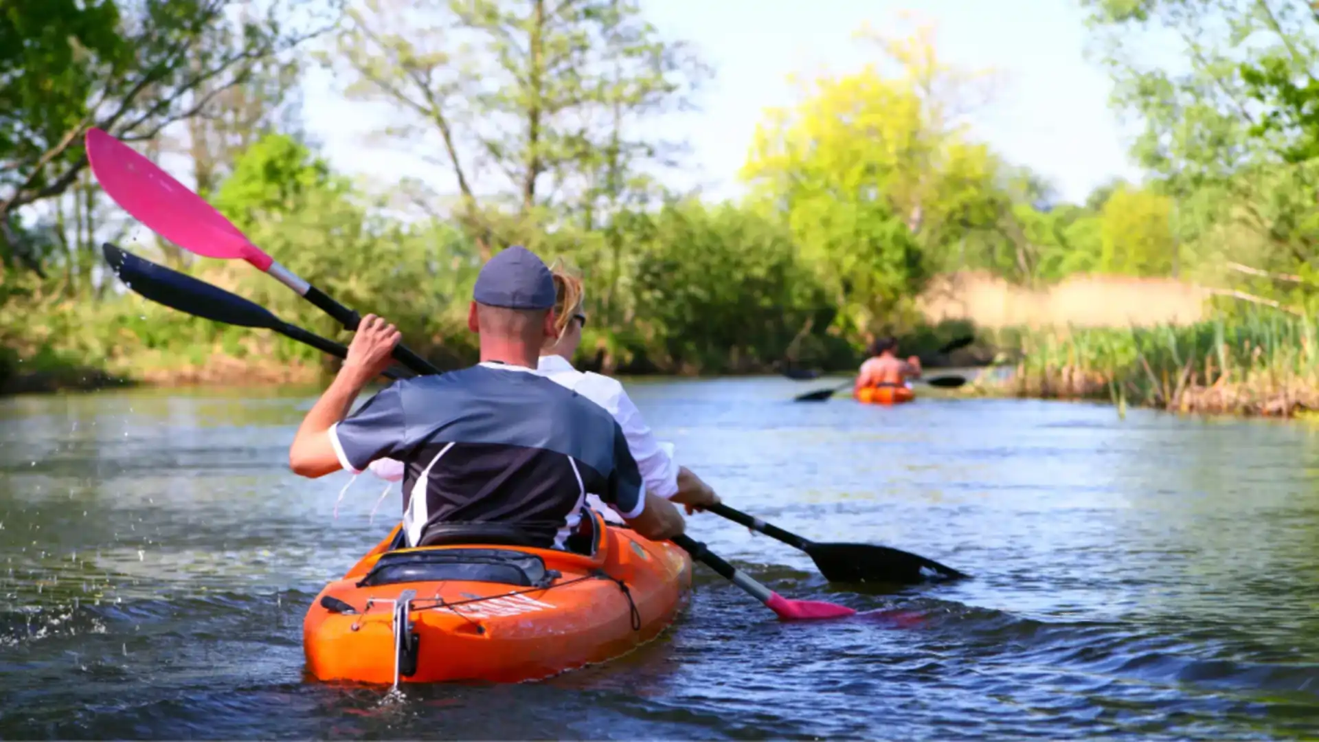 Two people paddling in a kayak